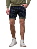Shorts à motif feuille pour homme