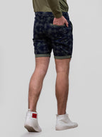 Shorts à motif feuille pour homme